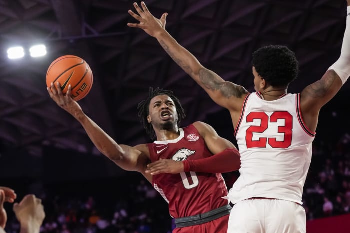 Arkansas Razorbacks guard Stanley Umude (0) shoots over Georgia Bulldogs guard Braelen Bridges (23) during the first half at Stegeman Coliseum. Umude finished with 31 points in the win.